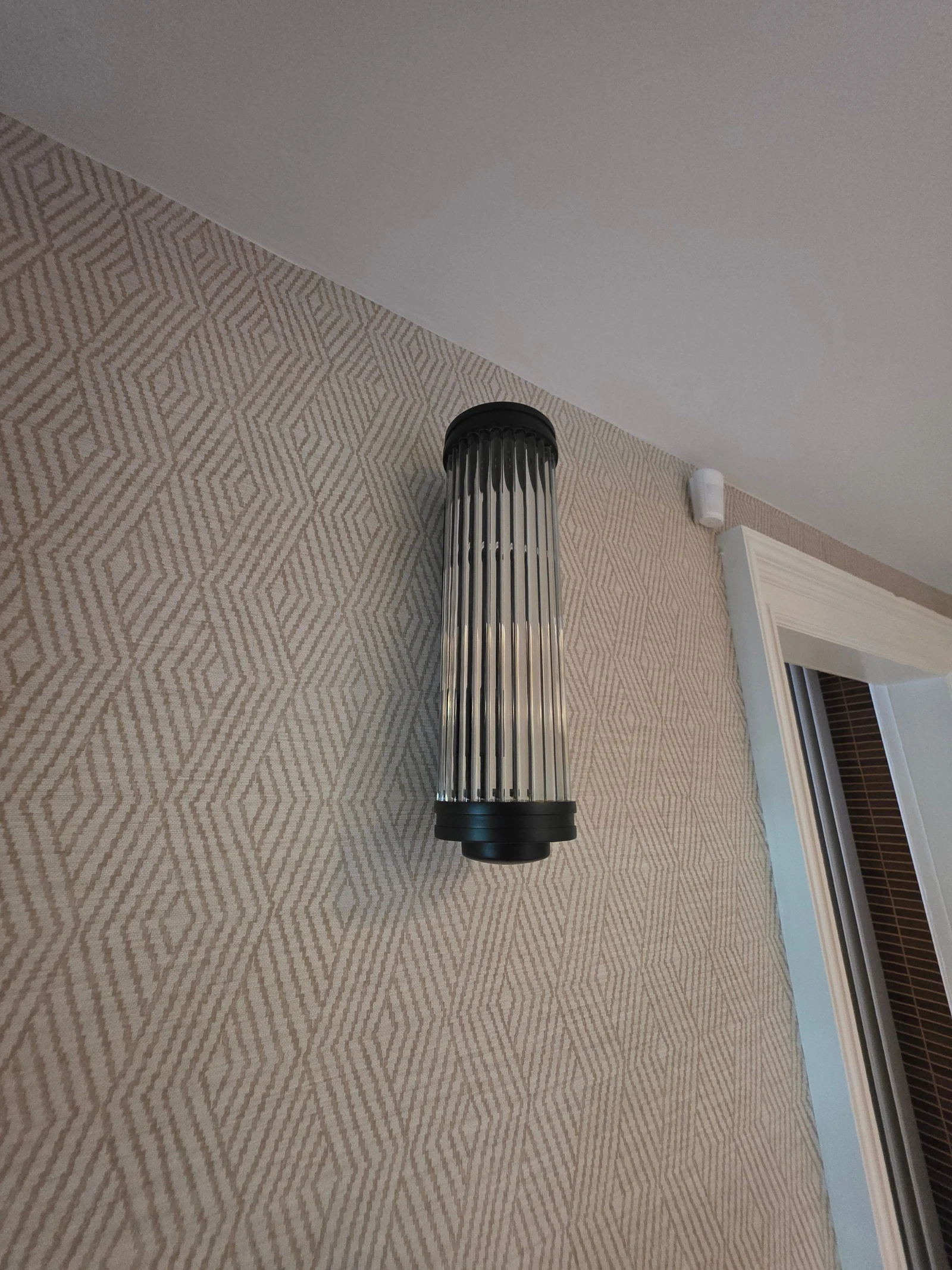 Ribbed wall light fitted in an Edinburgh period property by Spartan Electrical